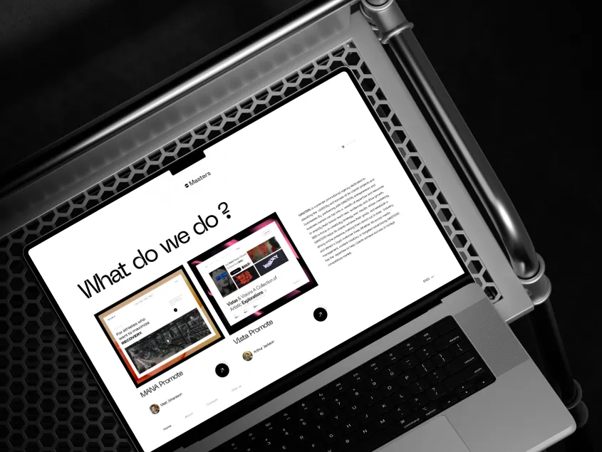 Masters business services displayed on a laptop mockup